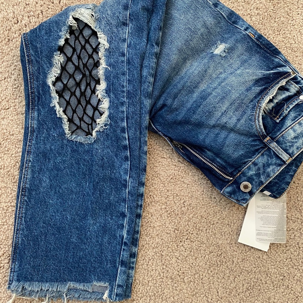 Jeans with lace knee detail